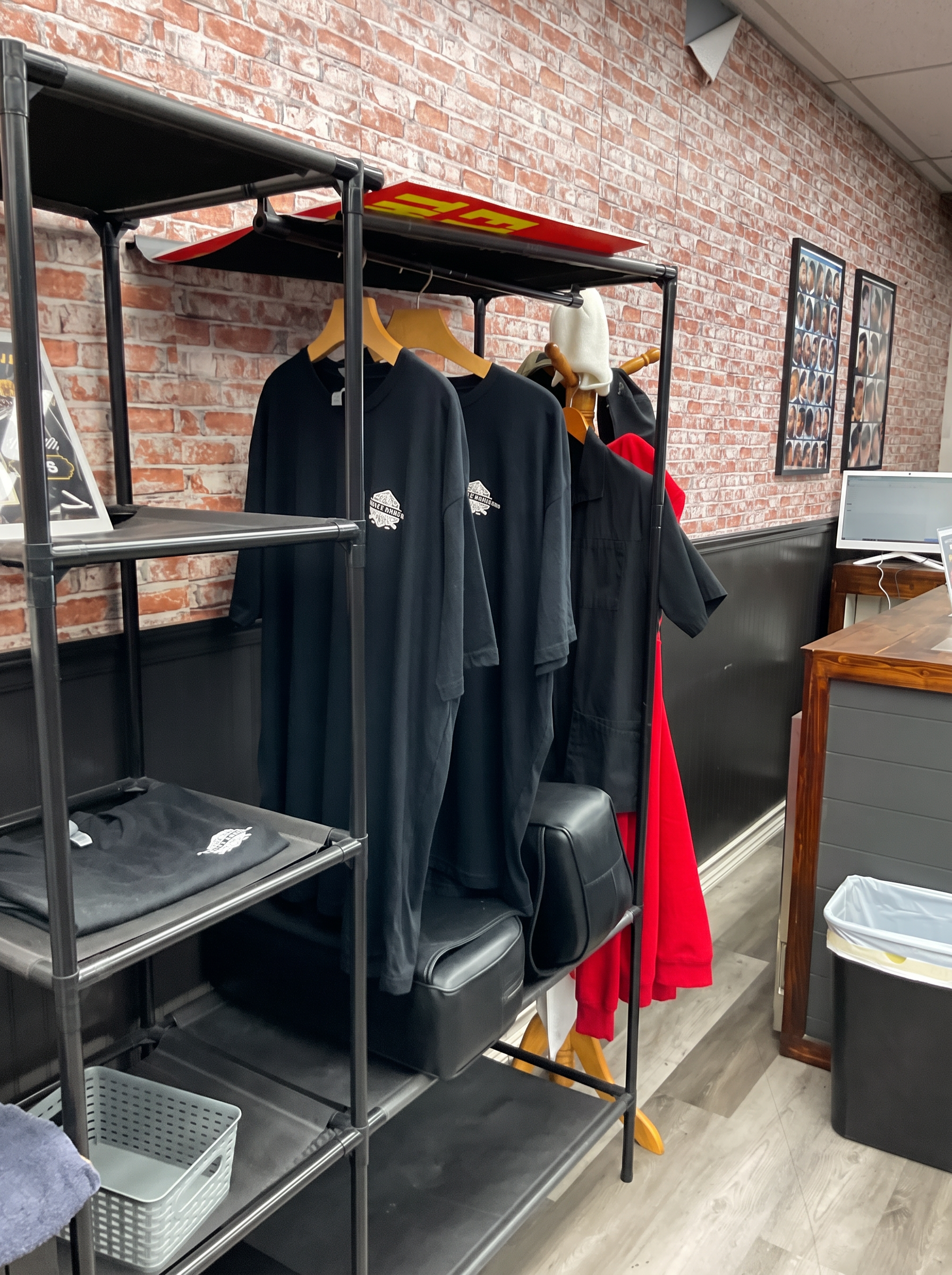 Dapper Cuts Barbershop branded apparel and merch rack