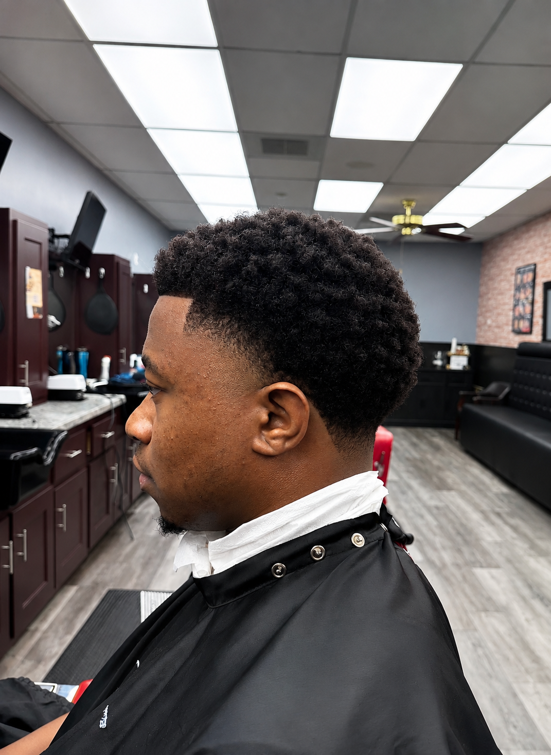 Afro taper fade with sharp line-up