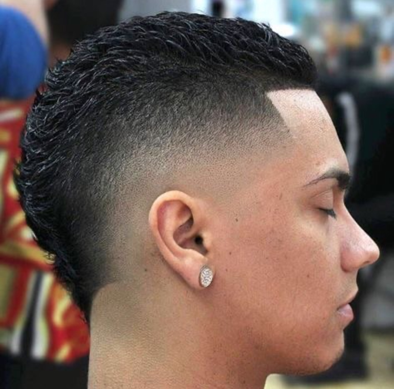 High skin fade with textured top