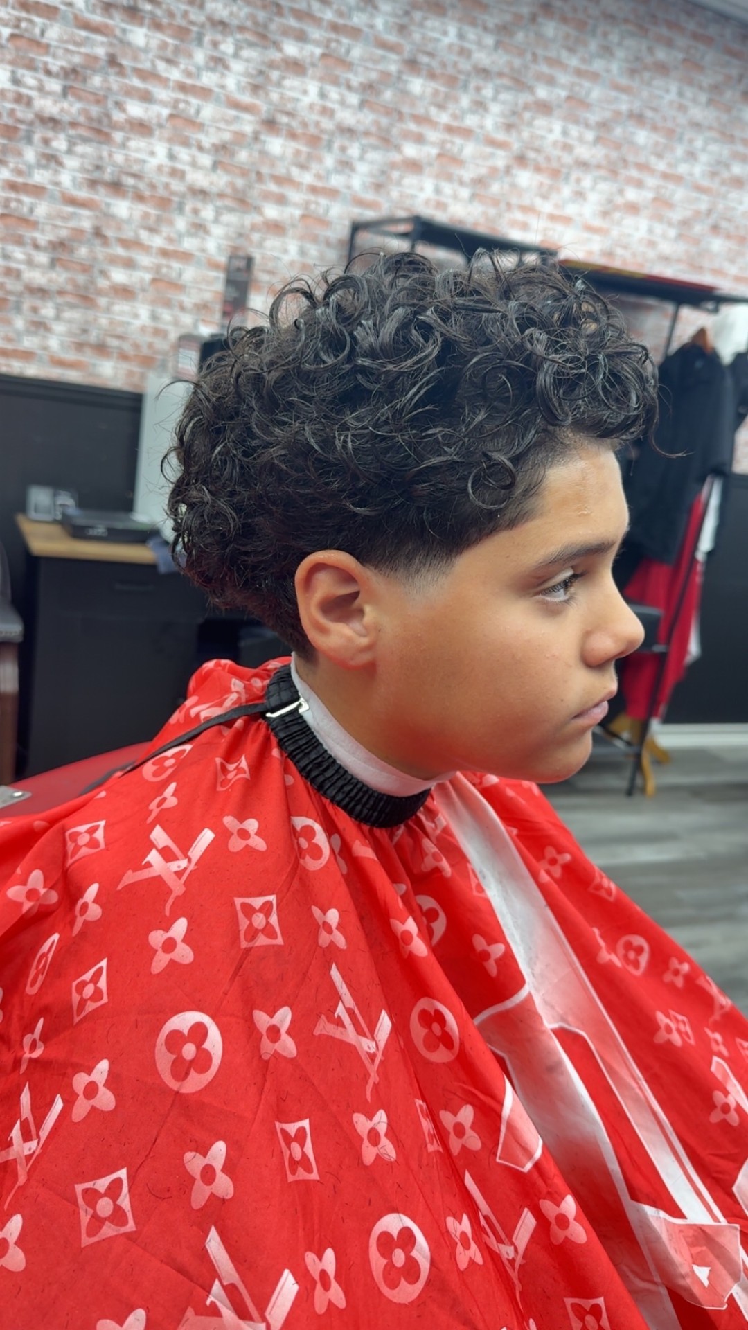Curly top with low taper — kids cut