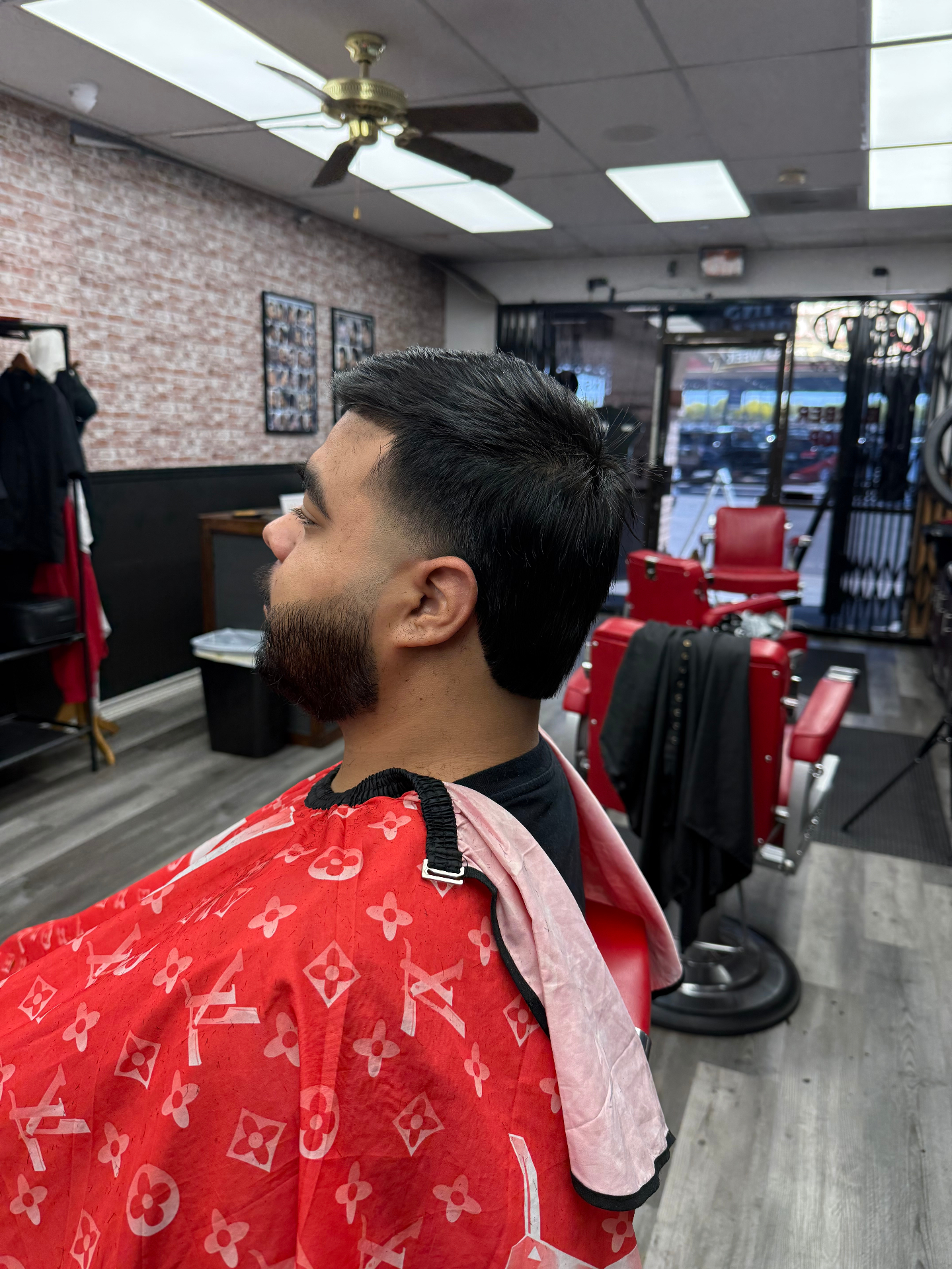 Mid fade with full beard sculpt