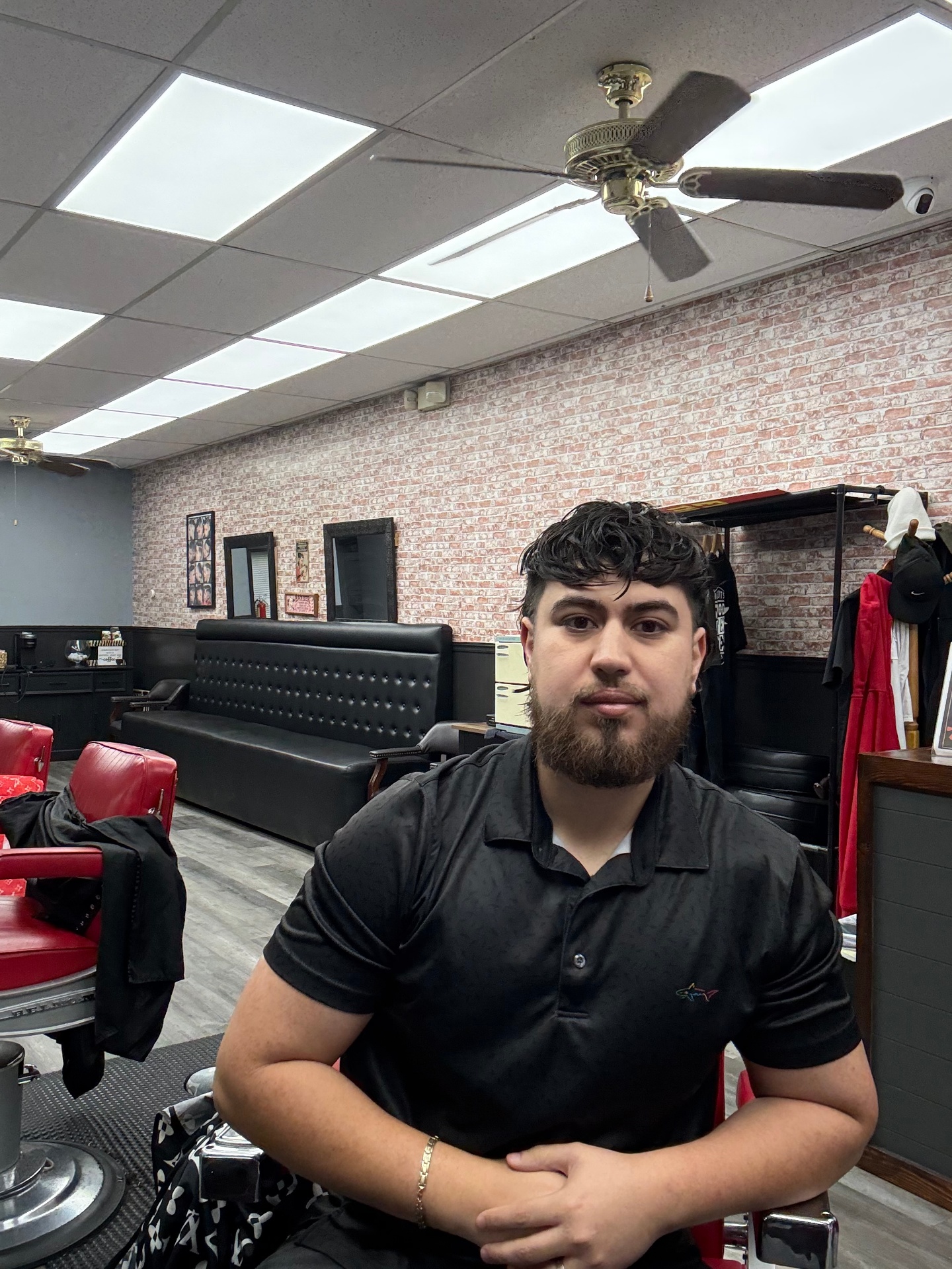 Leo, owner and master barber at Dapper Cuts Barbershop in Phoenix